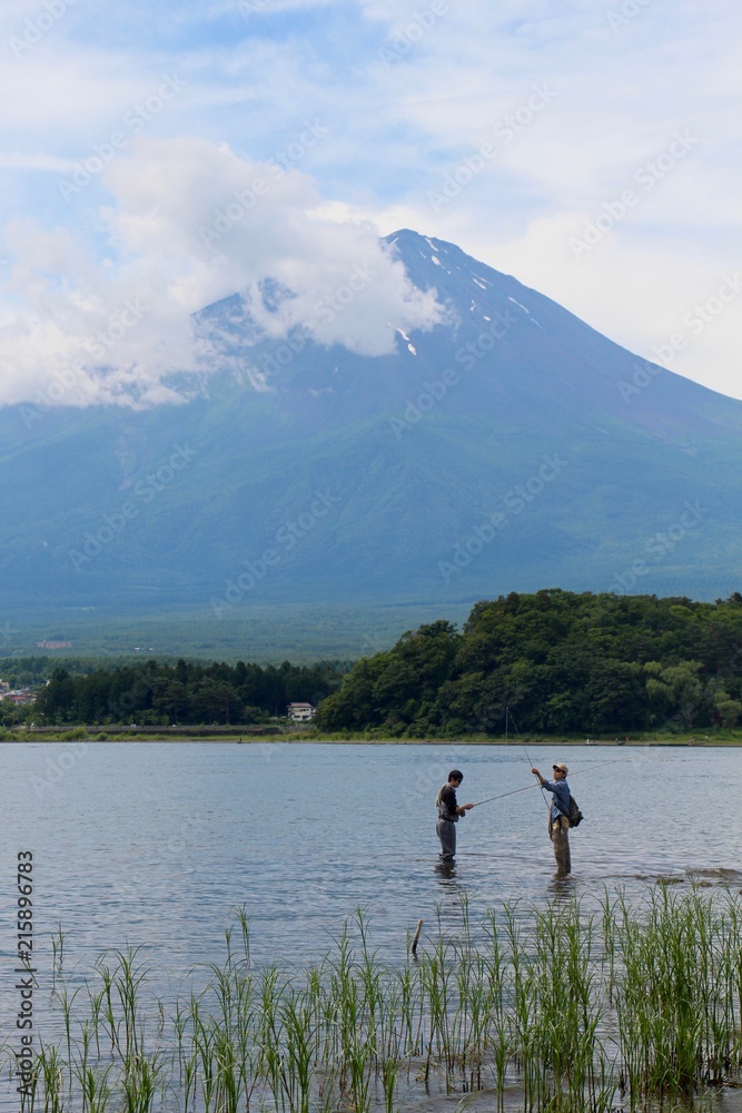 Local fishermen in front of Mt Fuji