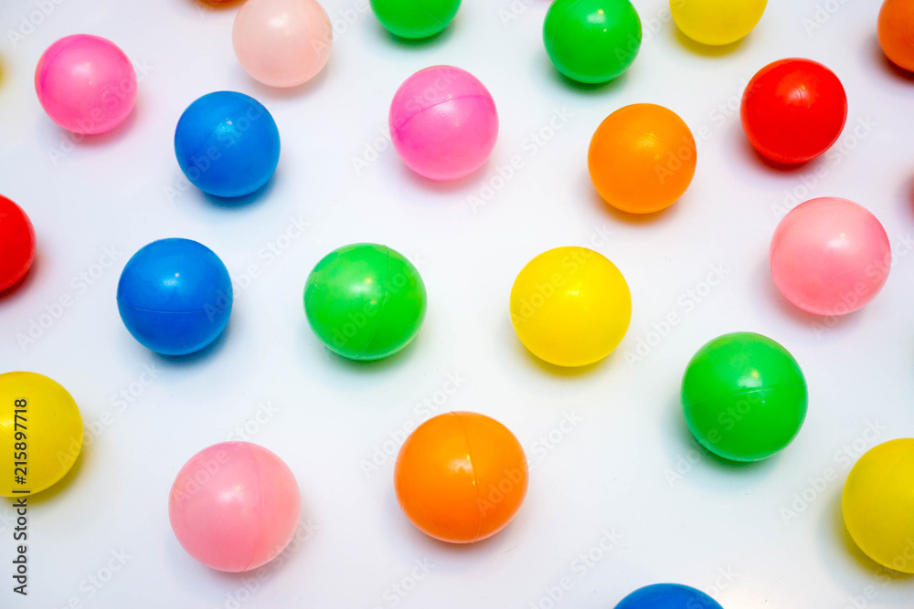 colorful plastic balls on a white background