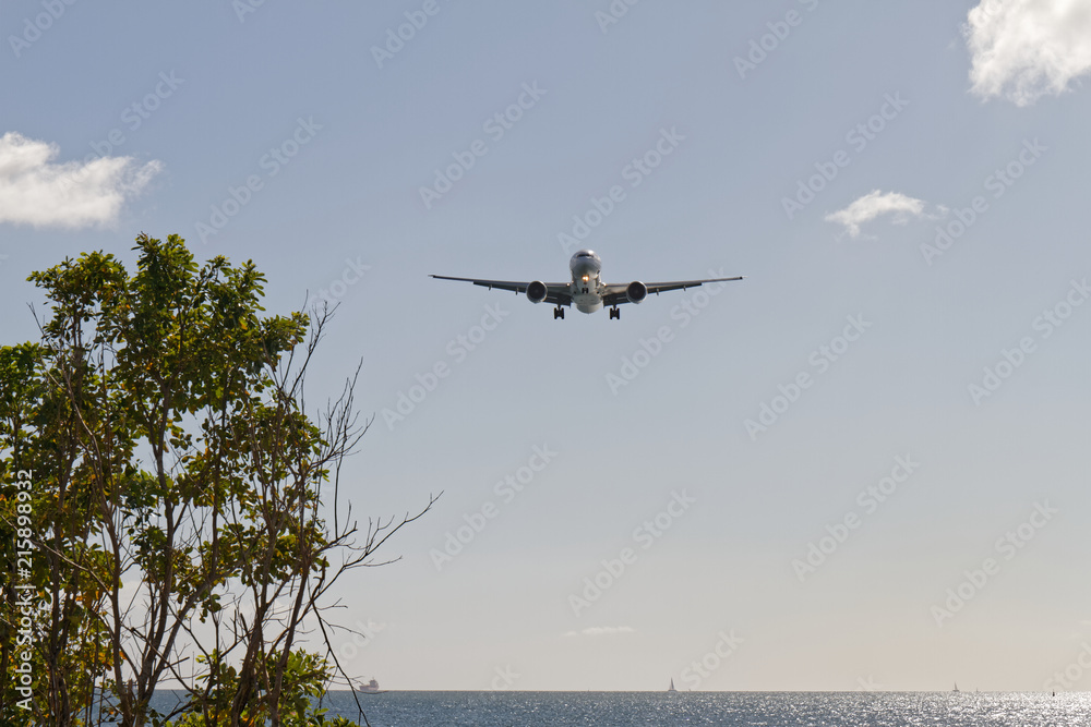 Martinique, FWI - Plane landing at Aime Cesaire Le Lamentin Airport
