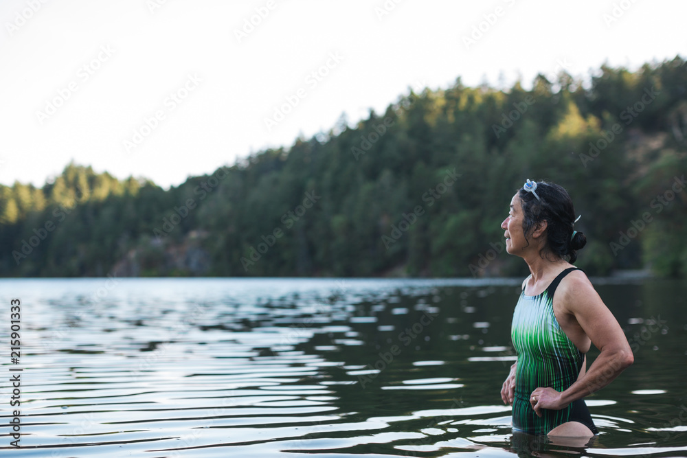 Portrait of smiling active woman after swimming in a lake Portrait of smiling active woman after swimming in a lake