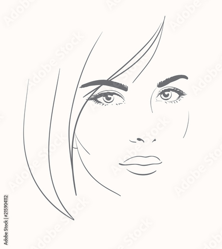 Young woman face with long blond hair