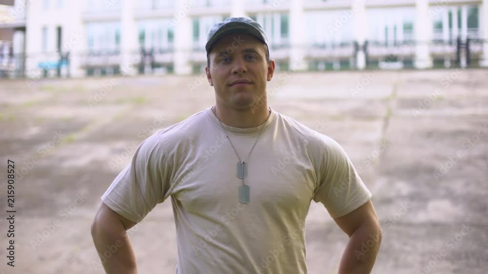 Handsome sergeant looking at camera, armed forces, military training