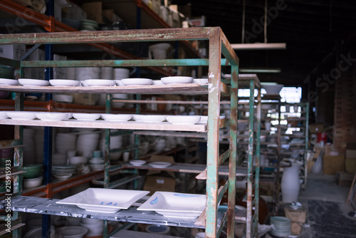 Ceramic dishes in working process. Creating ceramic pieces. Tradicional ceramic factory in spain © ABEL