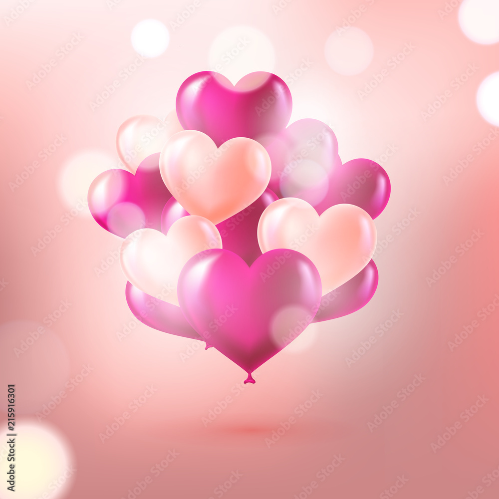 Pink heart shaped balloons on pastel pink background