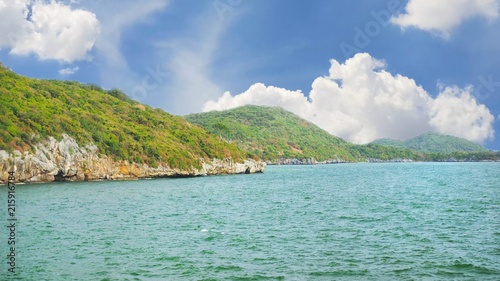 Beautiful tropical sea with mountain, blue sky and cloud at Koh Sichang in Thailand, Space for text in template, Travel concept, Many tourists visit here, View for seascape
