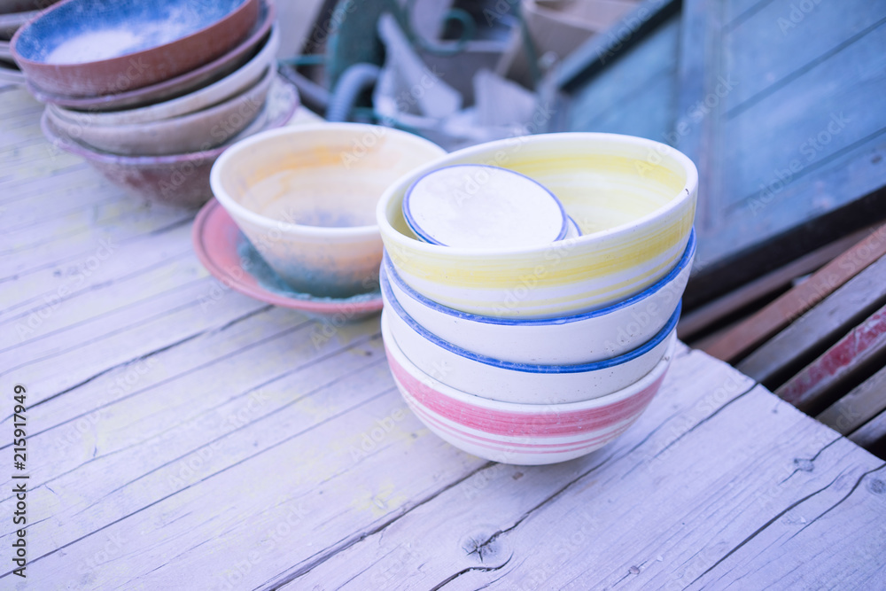 Ceramic dishes in working process. Creating ceramic pieces. Tradicional ceramic factory in spain Ceramic dishes in working process. Creating ceramic pieces. Tradicional ceramic factory in spain