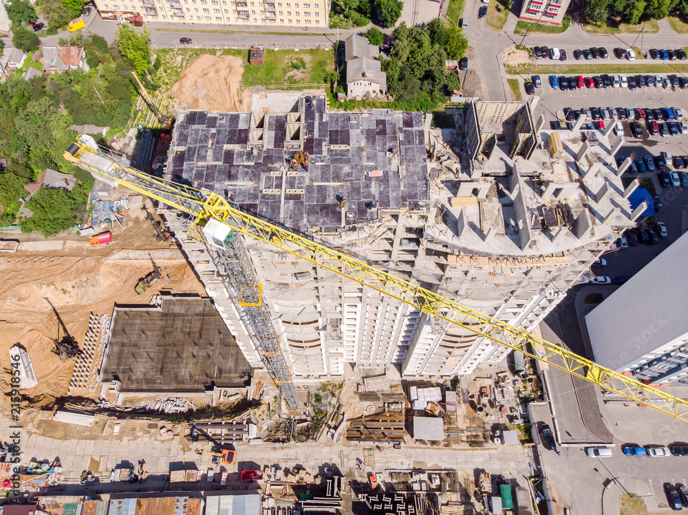 development of new residential area. aerial photo of construction site with crane