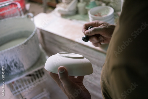 Ceramic dishes in working process. Creating ceramic pieces. Tradicional ceramic factory in spain