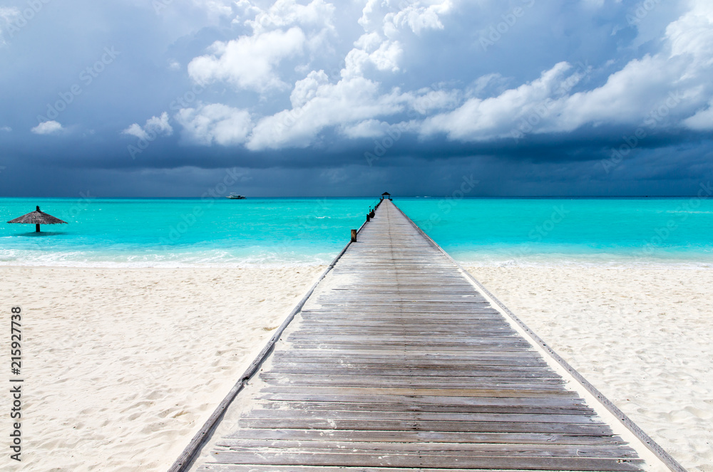  Maldives island with white sandy beach and sea