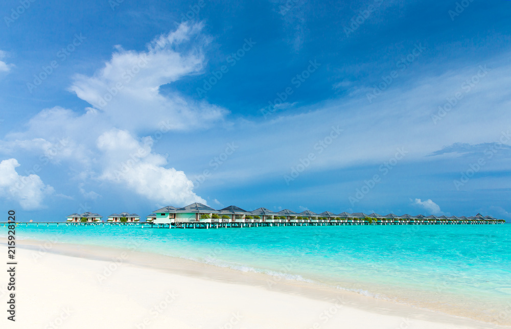 Fototapeta premium Maldives island with white sandy beach and sea