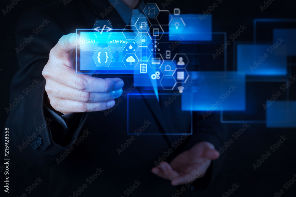 hand pushing on a touch screen interface hand pushing on a touch screen interface