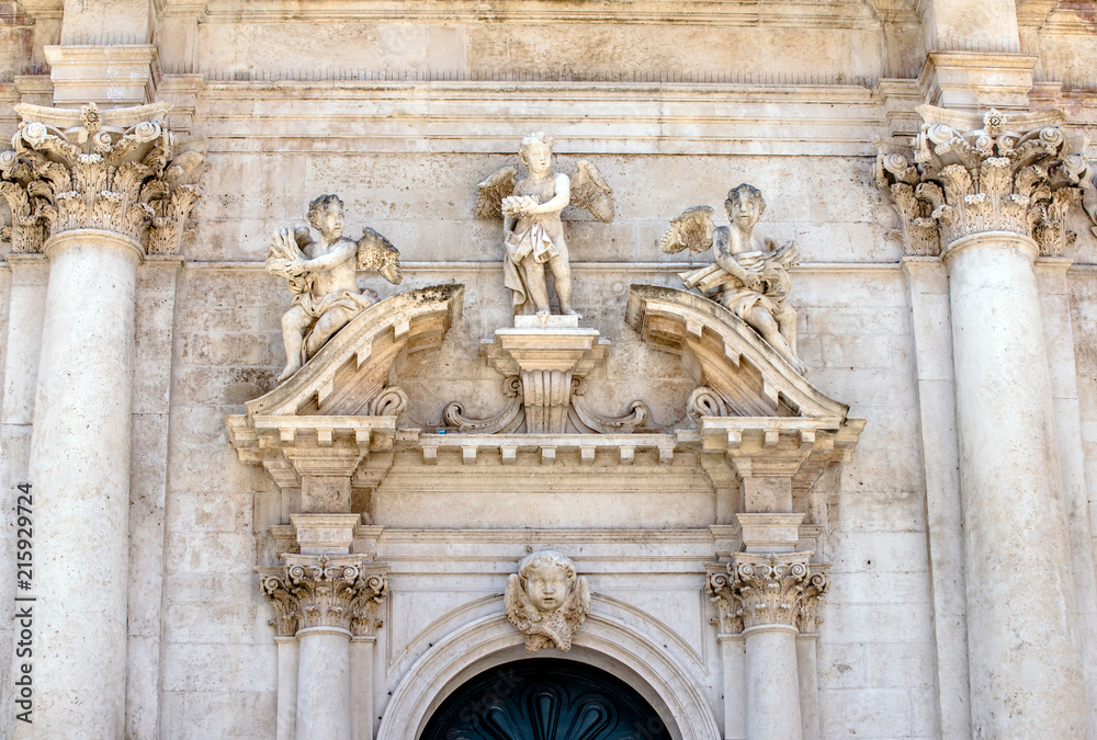 Obraz premium Bas-relief on an ancient Catholic Church in Dubrovnik,Croatia. 