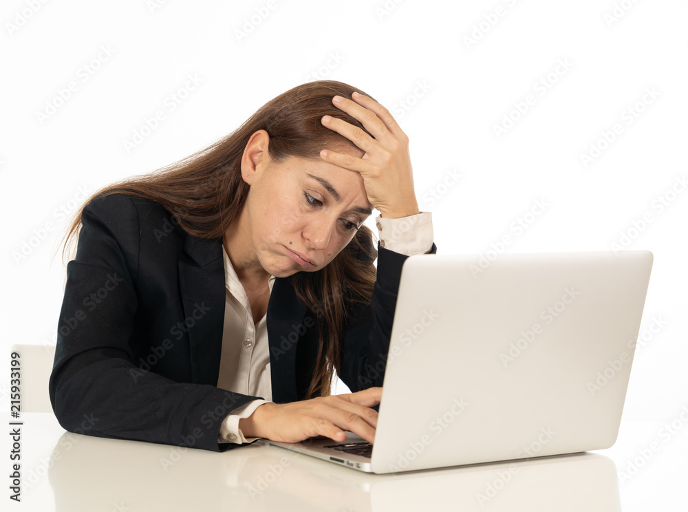 Young beautiful business woman suffering stress working at office computer desk feeling tired and desperate looking overworked overwhelmed and frustrated. In business education, fail and technology Young beautiful business woman suffering stress working at office computer desk feeling tired and desperate looking overworked overwhelmed and frustrated. In business education, fail and technology
