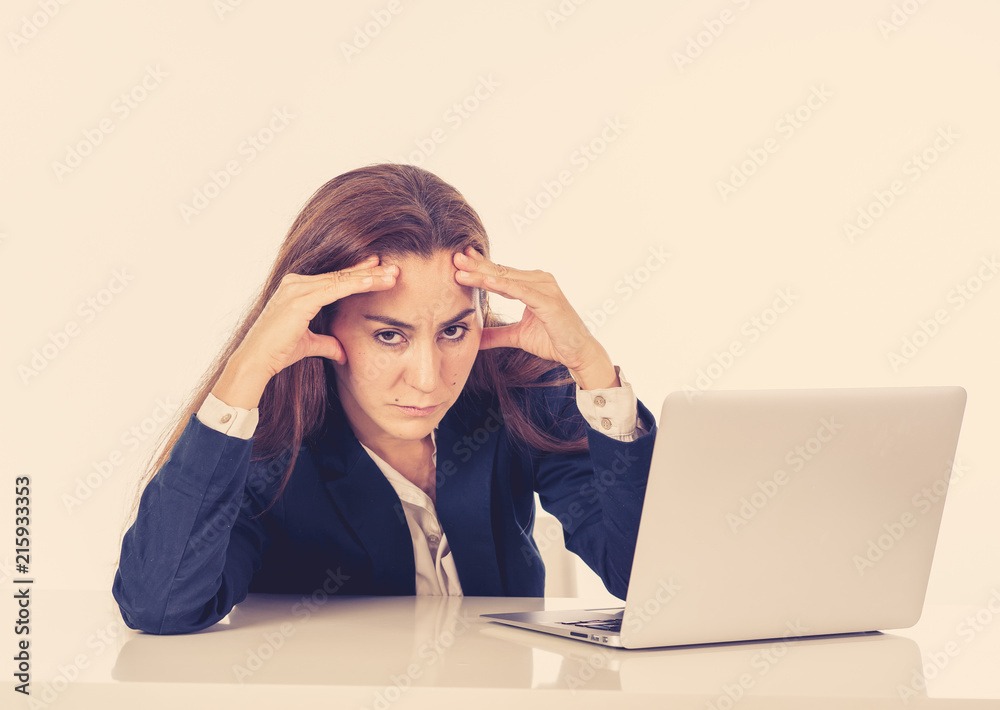 Young beautiful business woman suffering stress working at office computer desk feeling tired and desperate looking overworked overwhelmed and frustrated. In business education, fail and technology Young beautiful business woman suffering stress working at office computer desk feeling tired and desperate looking overworked overwhelmed and frustrated. In business education, fail and technology