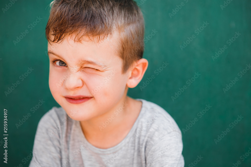 Close up portrait of boy laughing Close up portrait of boy laughing