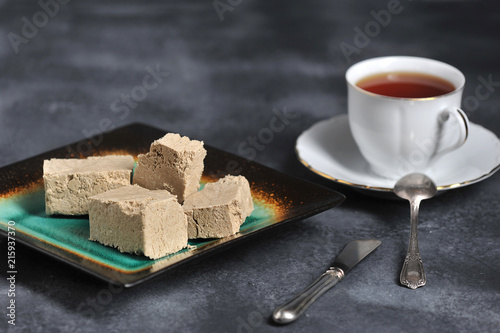 halva chopped into slices on a plate