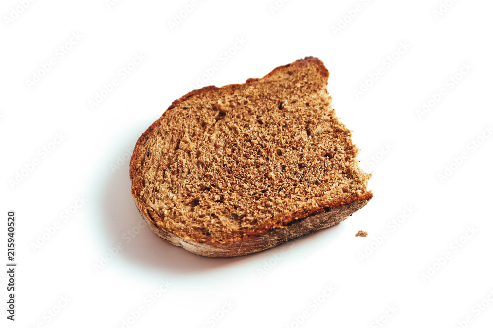 A piece of handmade freshly baked rye bread, isolated on white background. A piece of handmade freshly baked rye bread, isolated on white background.