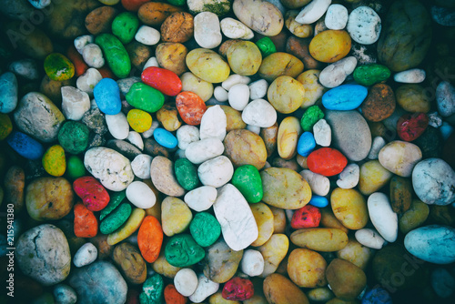 Colorful pebbles background or colored gravel background