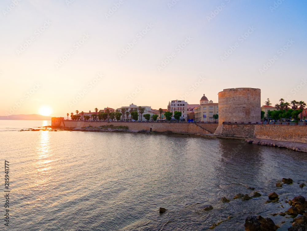 View of the promenade and the old walls of alghero. Alghero, Sardinia, Italy. View of the promenade and the old walls of alghero. Alghero, Sardinia, Italy.