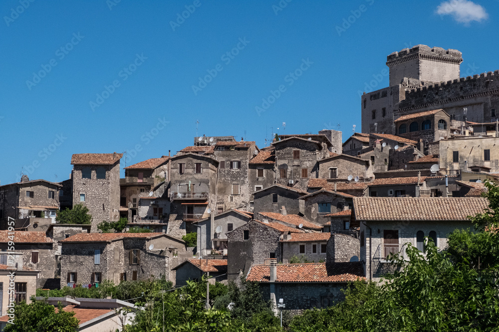 Scenic landscape view of a medieval village with a castle.