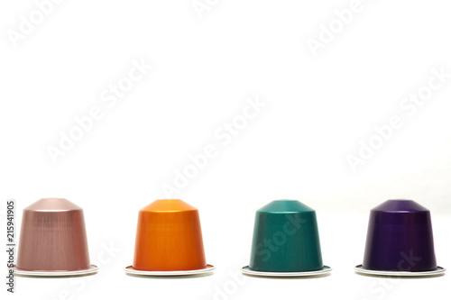 Classic coffee capsules isolated on white background
