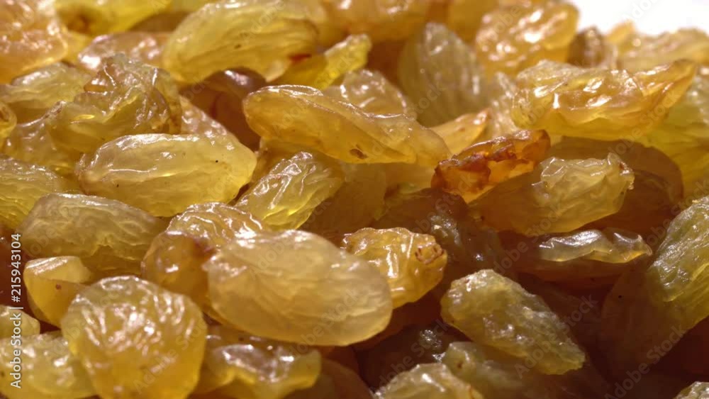 Light raisin largely. Healthy food. Dried fruits. Movement in a circle. 4K. Light raisin largely. Healthy food. Dried fruits. Movement in a circle. 4K.