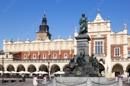 Main Market Square of the old Town with Cloth Hall, Town Hall Tower, Adam Mickiewicz monument, Krakow, Poland