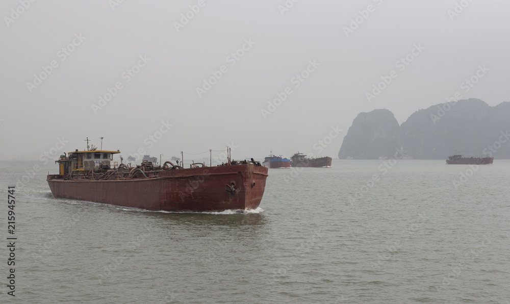 Fototapeta premium Tanker in the sea of halong bay in vietnam