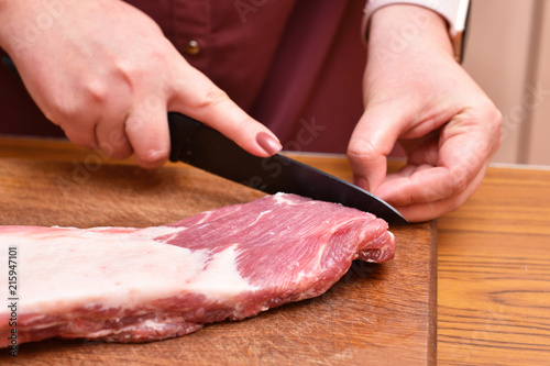 Trim excess fat from pork meat on the ribs. To remove unwanted fat on the meat