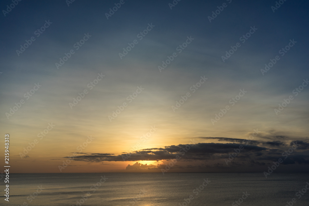 sunset ocean scene on tropical beach