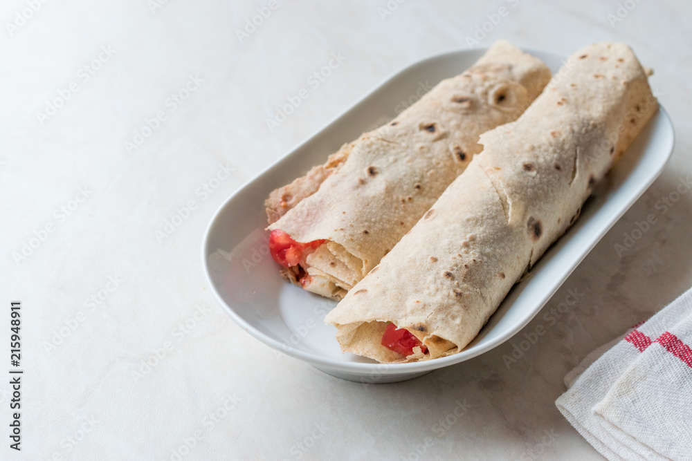 Turkish Fast Food Wrap Gozleme with Tomatoes and Cheese Turkish Fast Food Wrap Gozleme with Tomatoes and Cheese