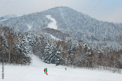 Man  play snow board at Furano snow mountain in  Hokkaido, Japan