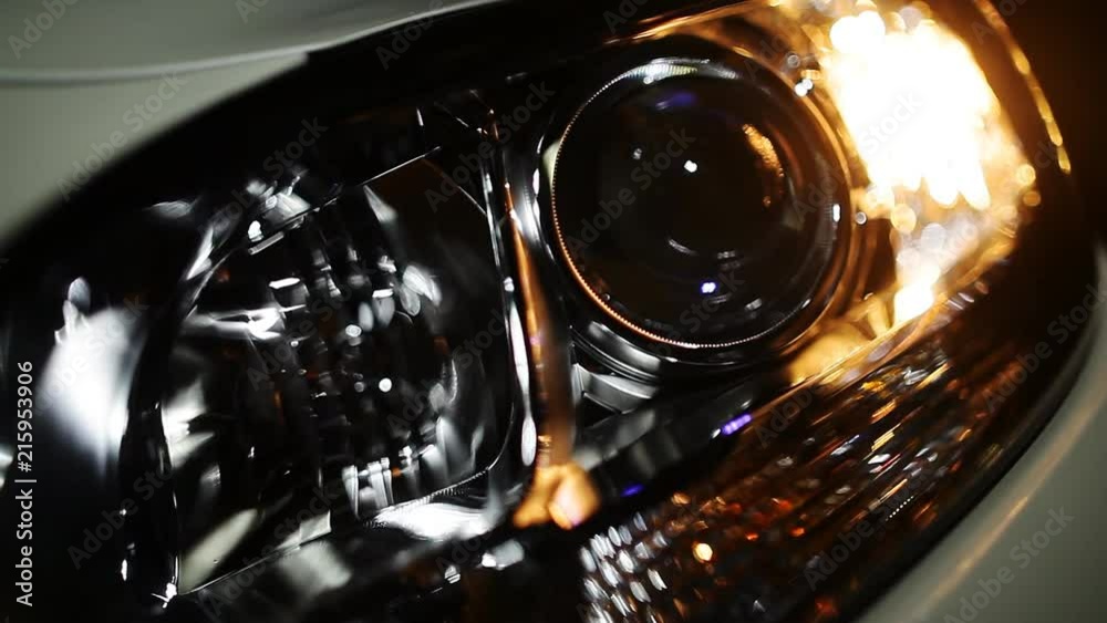 A fantastic look at the automotive headlamp. Car headlights flashing