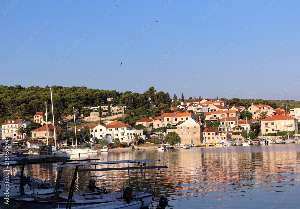  Beautiful small boats in the harbor of Postiral town Croatia, Brac island.