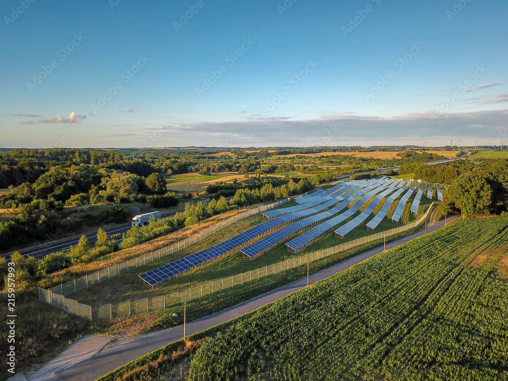 aerial view of landscape near rostock - german autobahn and solar power plant