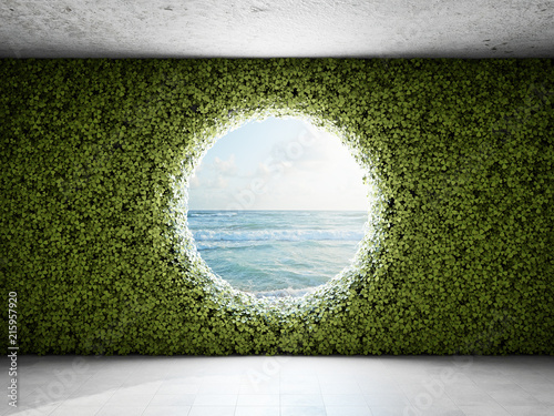 Obraz zielona ściana i duże okrągłe okno z widokiem na morze