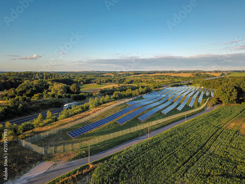 aerial view of landscape near rostock - german autobahn and solar power plant