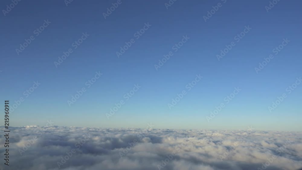 Aerial view of flowing clouds over Japan Alps mountain. Airplane shot. Aerial view of flowing clouds over Japan Alps mountain. Airplane shot.