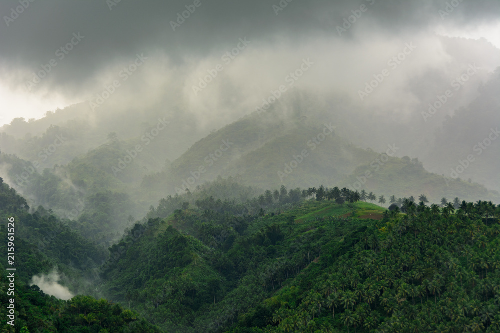 Cloudy mountain landscape. Negros Island Philippines. Gloomy landscape in the mountains - fog and clouds thicken in the mountains. Asia