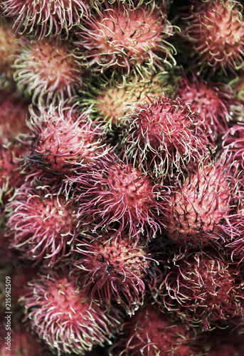 Fresh rambutan fruit closeup detail © Longjourneys