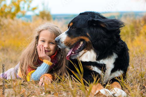 girl with dog Berner Sennenhund
