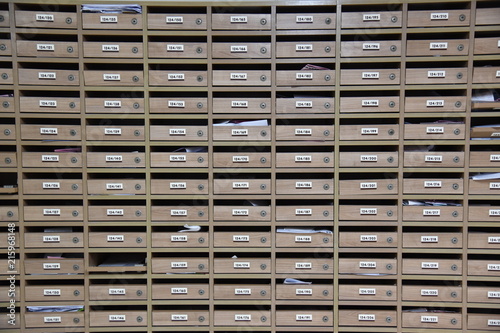 Mailboxes in the condo. wooden mailbox pattern with lockable center in condo.