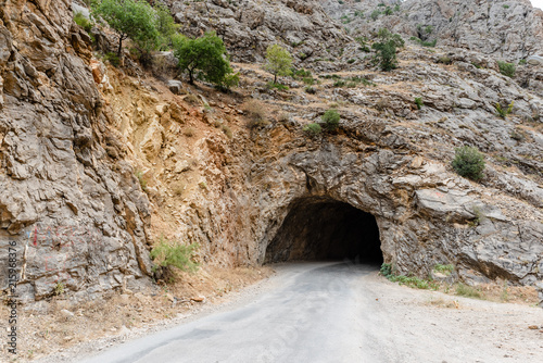 View of dark old long tunnel used to to go Town of Kemaliye