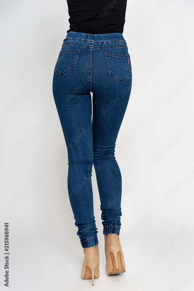 beautiful female ass in tight jeans Photos | Adobe Stock
