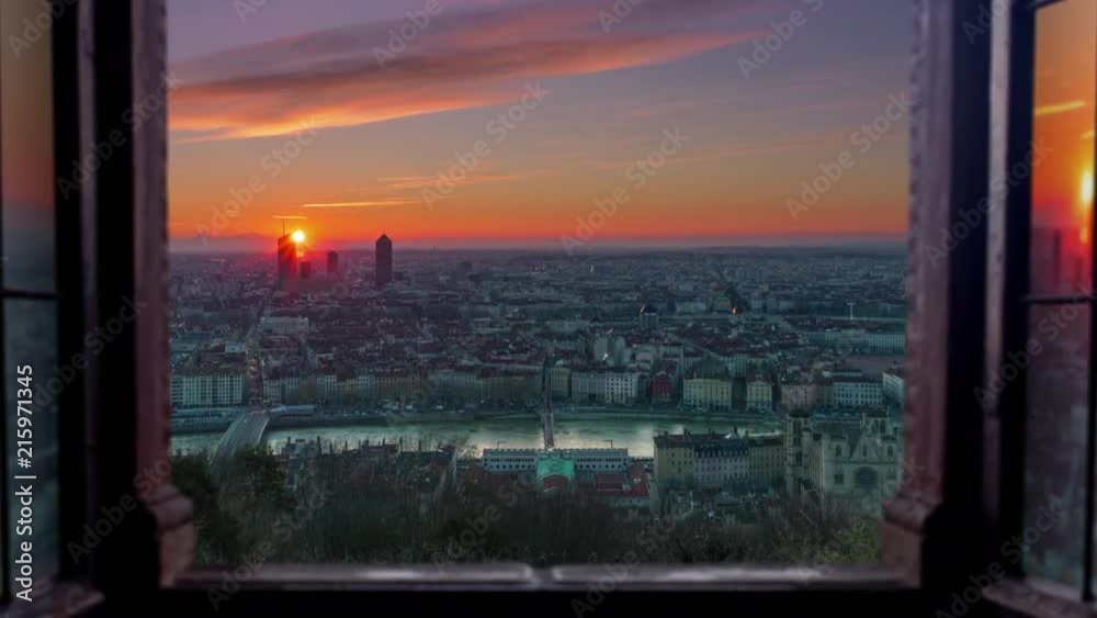 Lyon cityscape aerial view seen through window timelapse night to day
