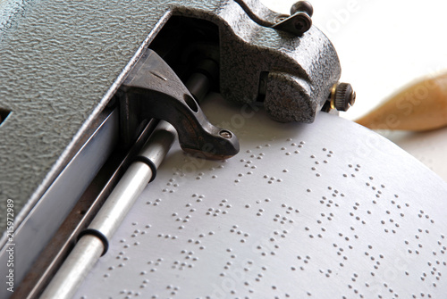 Braille machine writing photo