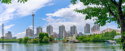 Lotte World amusement theme park around Seokchon lake, a major tourist attraction in Seoul, South Korea.
