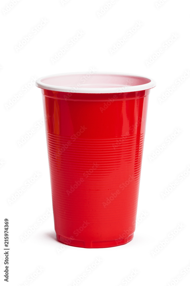 Red plastic cup isolated in a white background Red plastic cup isolated in a white background