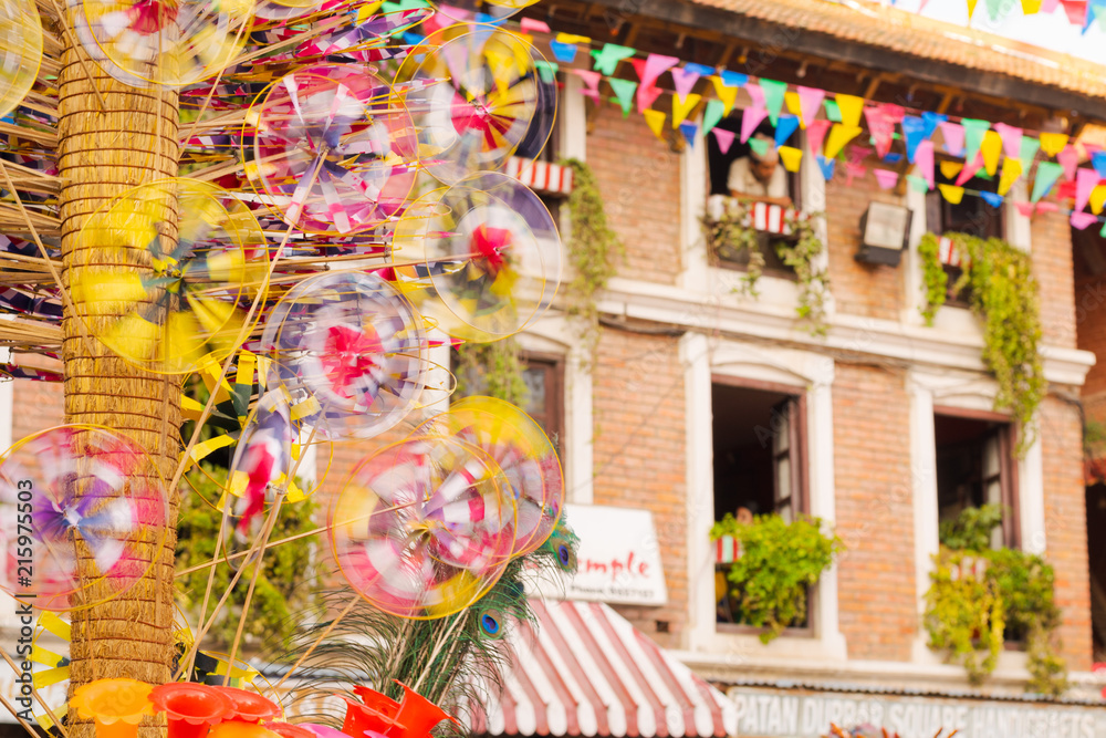 Naklejka premium Prayer flags and decorations are held over Patan Durbar Square in Kathmandu, Nepal, during Krishna's birth festival celebrations.
