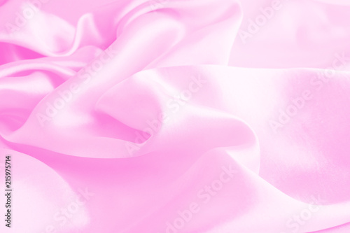 Smooth elegant pink silk or satin texture can use as abstract background, fabric